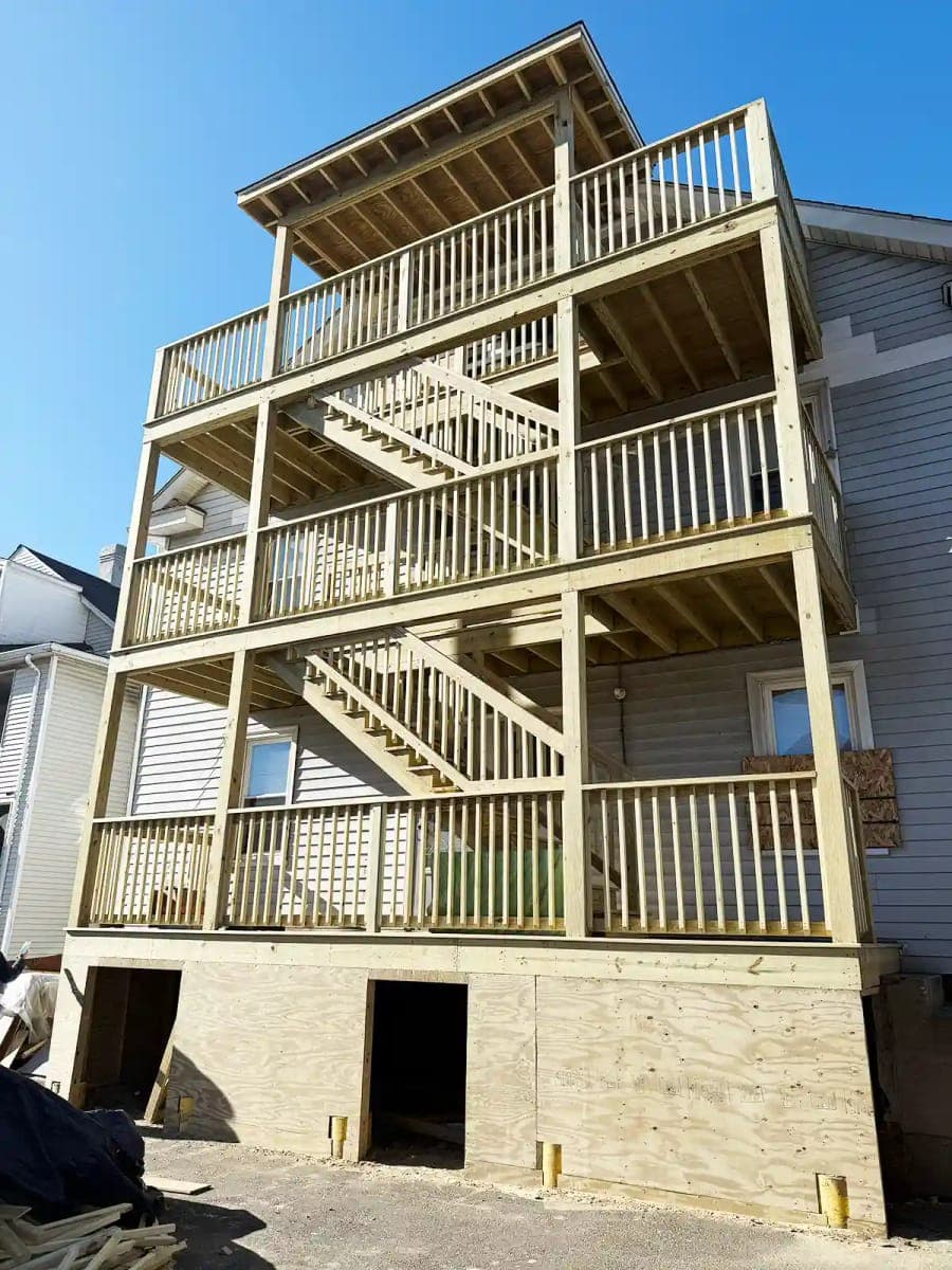 Covered Deck — bathroom remodel by Omega Development