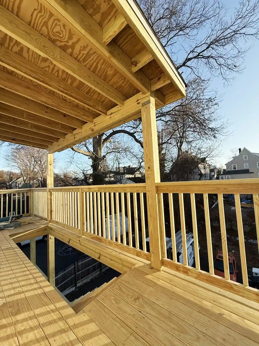 Modern Backyard Deck — bathroom remodel by Omega Development