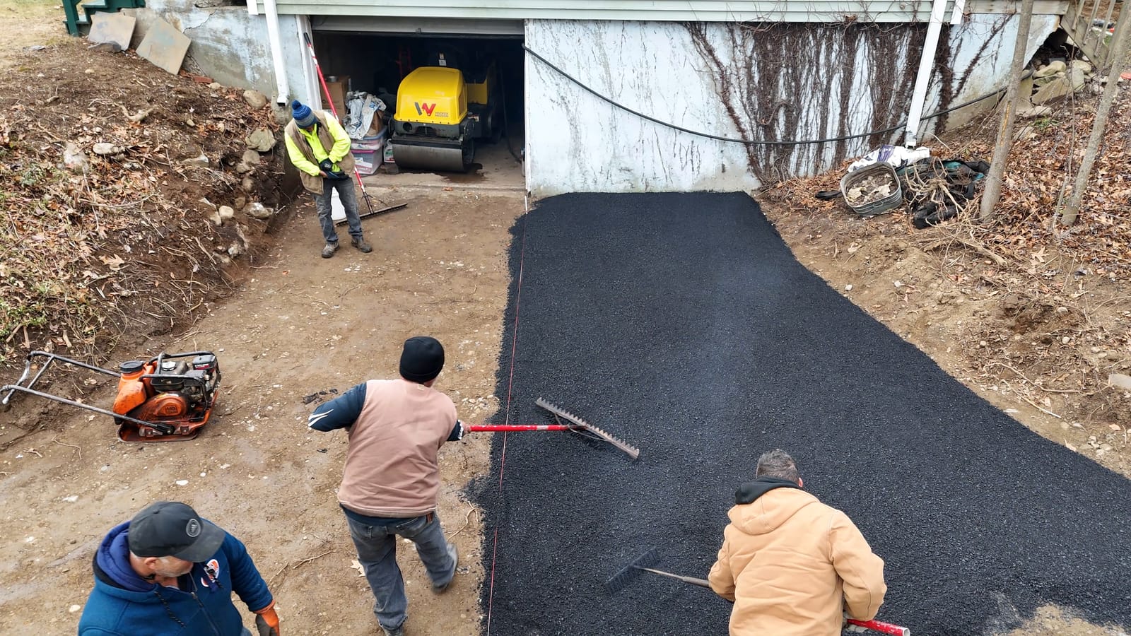 Fresh asphalt being spread