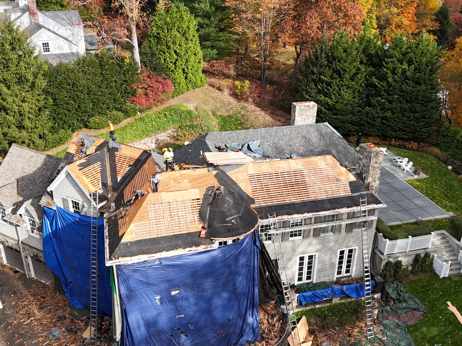 Tear-Off with Tarp Protection — Omega Development roofing
