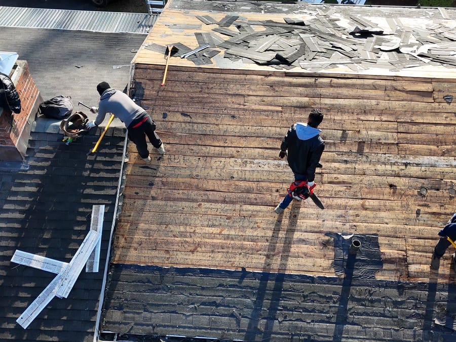 Tear-Off — Old shingles stripped down to the boards.
