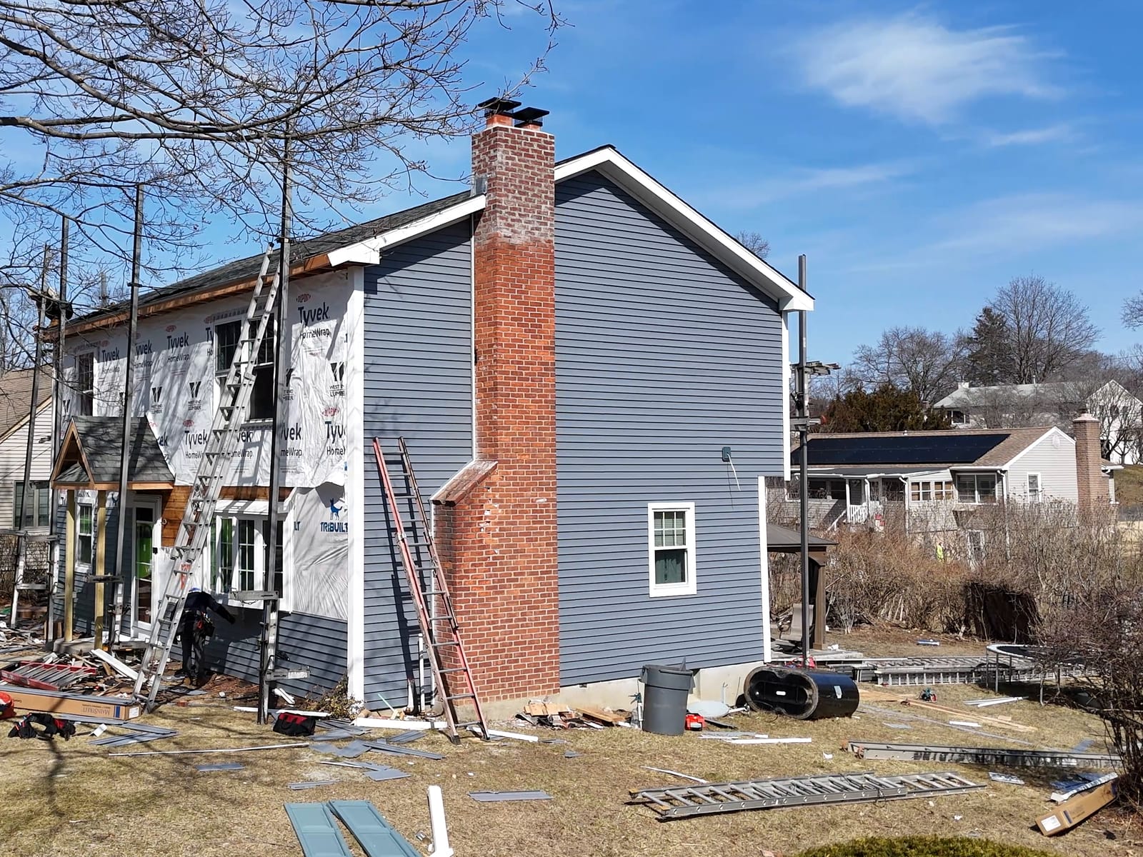 Whole-House Siding in Progress — Omega Development siding