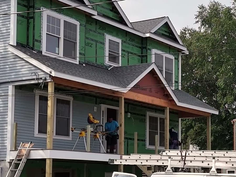 Sealed Walls — Walls sheathed and sealed before siding.