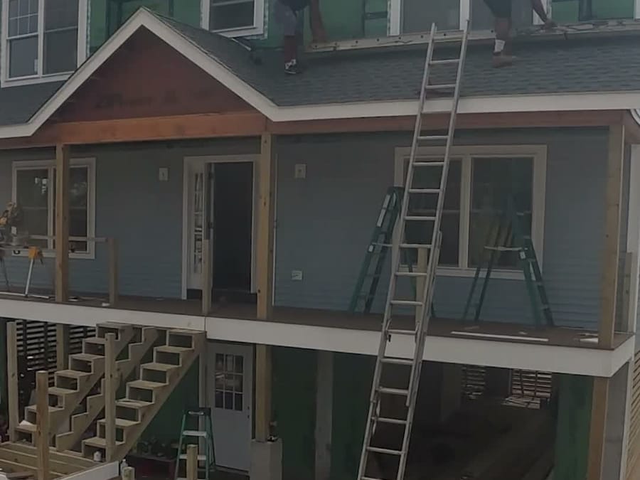 Upper Walls — Courses worked up to the gables.