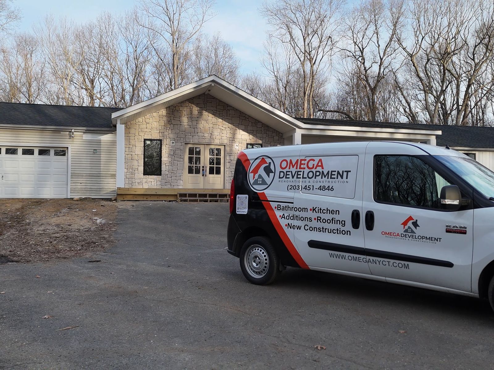The finished front with white siding