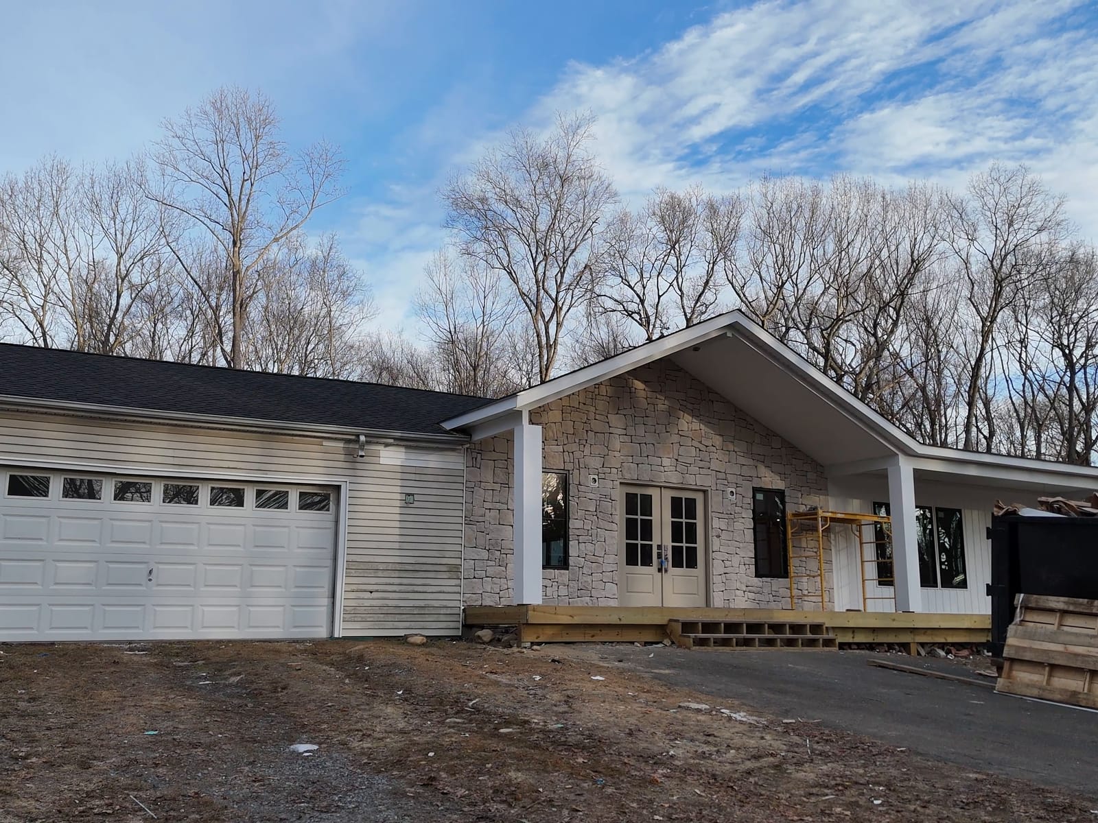 Rebuilt Front Exterior — Omega Development siding