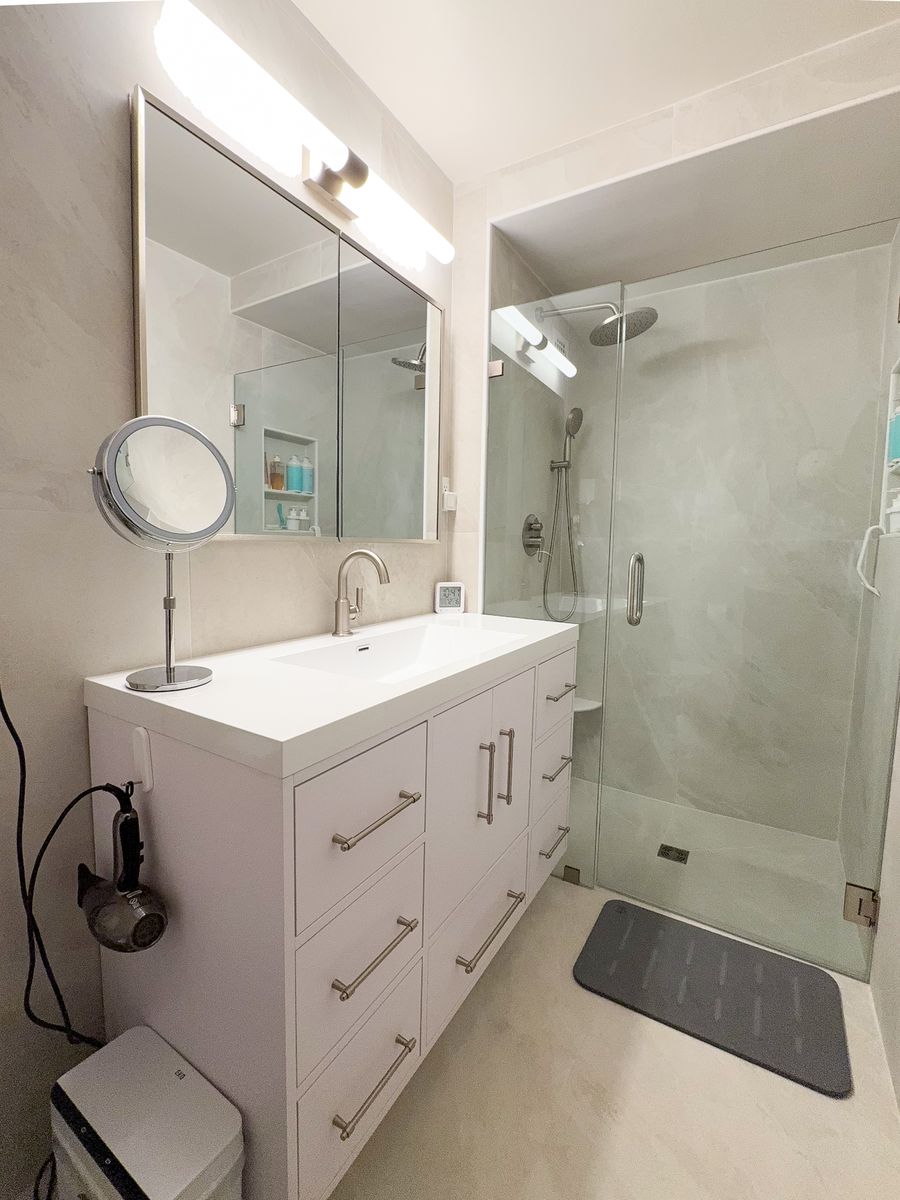 Finished main bathroom with walk-in shower and wide vanity