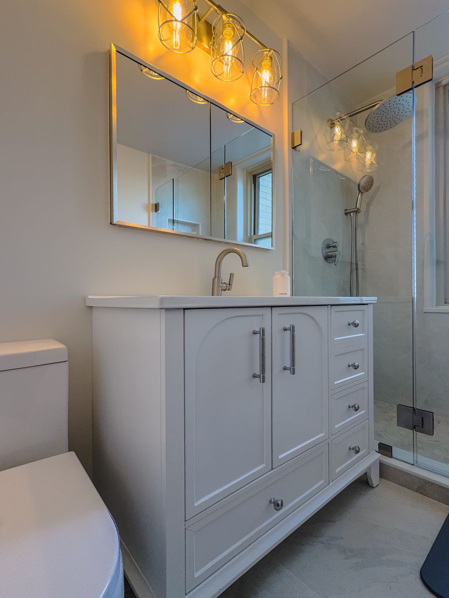 Finished second bathroom with vanity and glass shower